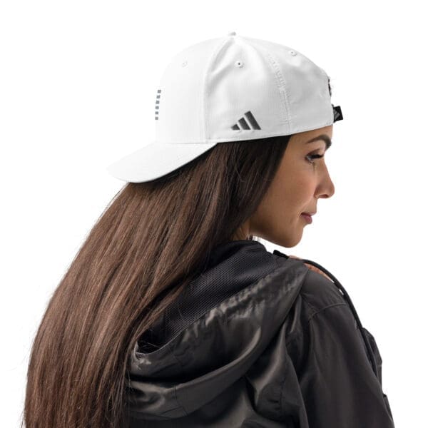 woman wearing adidas cle-veland a-maze performance cap in white